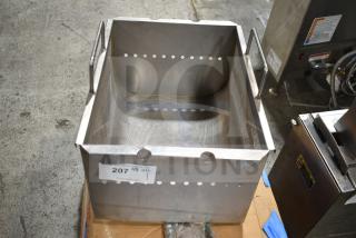 Stainless steel fryer insert with side handles and perforated design, slightly used, auction label "207" visible.