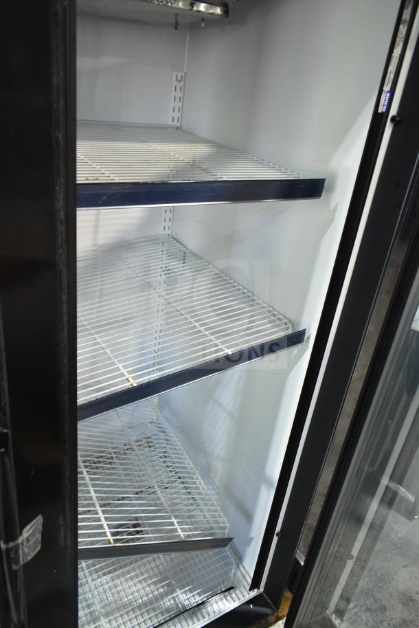 McCray GF48-CAR-BE-DHL commercial 2 door reach-in cooler, empty interior, wire shelving, on casters, 115/208-230V, 1 phase.