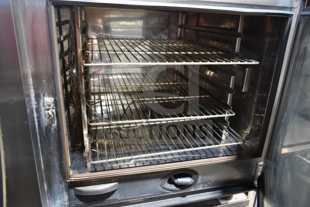 2019 Rational SCC WE 62G commercial combi convection oven, natural gas, on double pan rack stand, clean interior.