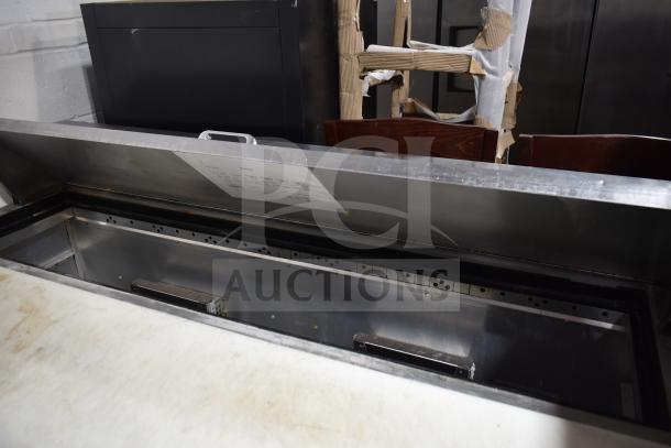 2019 True TSSU-60-16D-2-HC sandwich salad prep table, stainless steel, 115 volts, open top, clean interior.