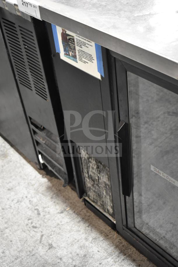 True TBB-24-60G-SD 2 Door Back Bar Cooler, commercial grade, black finish, glass doors, 115V, used condition.
