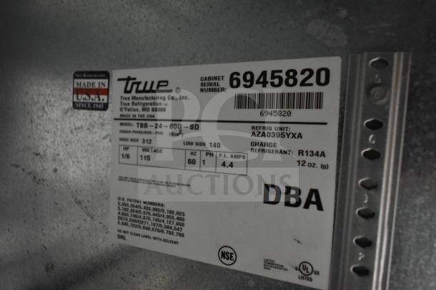 True TBB-24-60G-SD commercial back bar cooler label, features 115 volts, 1 phase, model info, and refrigerant details.
