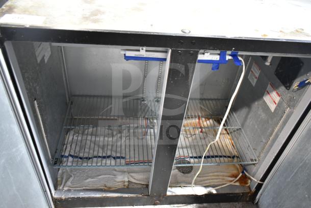 Beverage Air BB48HC-1-B 2 Door Undercounter Cooler, commercial use, 115V, 1 phase, visible wear and rust, interior shelving.