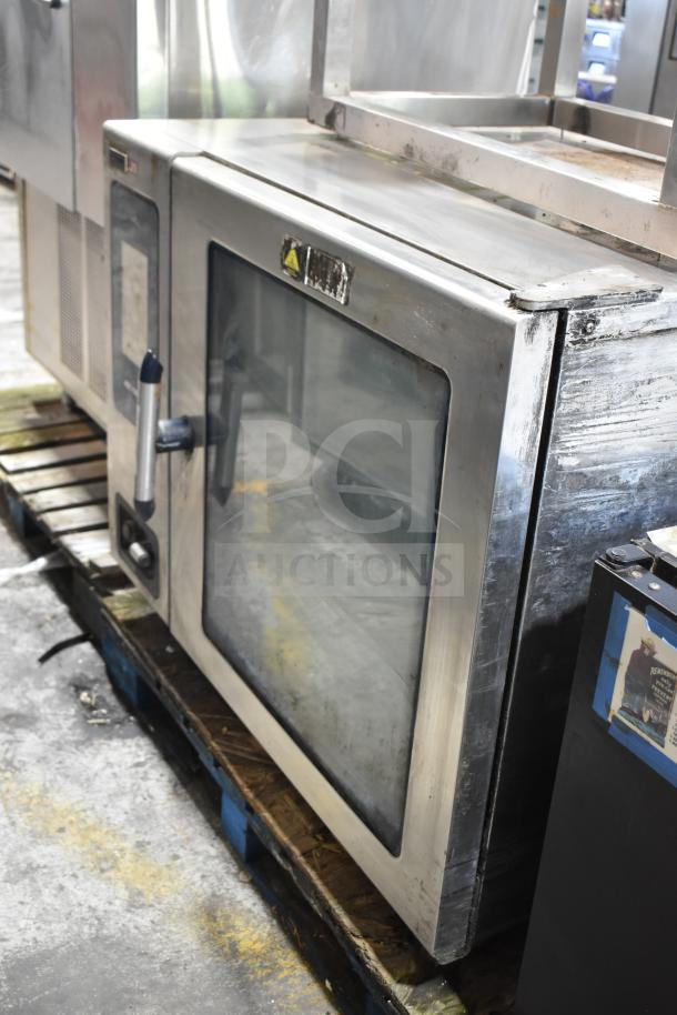 2017 Alto Shaam CTP7-20E stainless steel commercial combi convection oven with equipment stand, 208-240V, 3-phase.