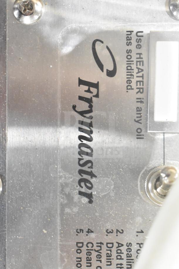 New Frymaster PF50 Portable Fryer Oil Filter, 110-120V, 1 Phase. Scratch and dent condition. Features label with usage instructions.