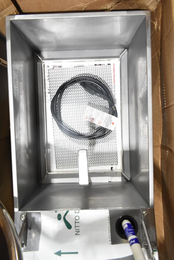 Brand new Frymaster PF50 portable fryer oil filter, 110-120V, 1 phase, with scratch and dent. Includes power cord.