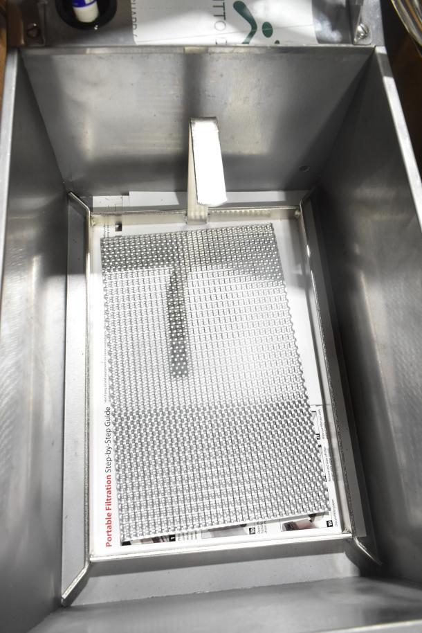 BRAND NEW Frymaster PF50 Portable Fryer Oil Filter, 110-120V, scratch and dent, includes filtration guide visible.