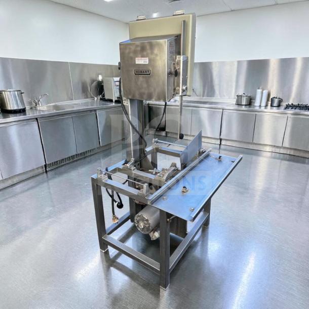 Superior condition Hobart 5701D commercial meat saw, 3 HP, 3 phase, heavy-duty, fully tested, operational, Hobart logo visible.