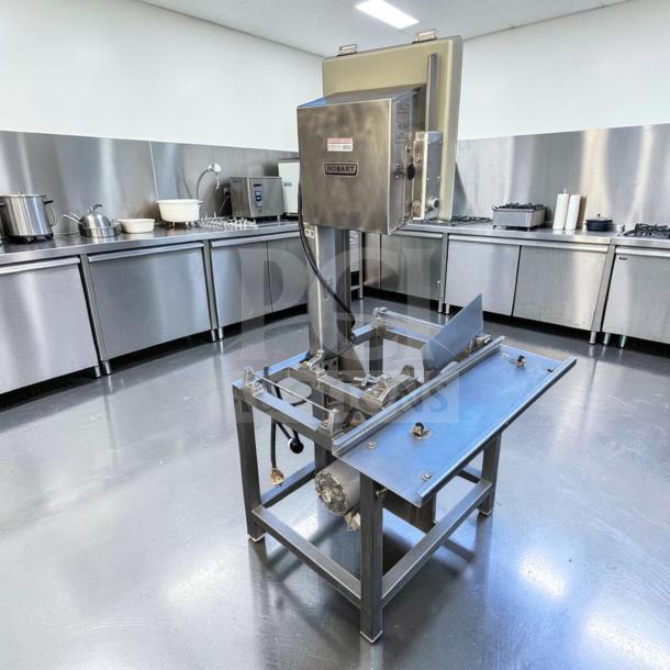 Hobart 5701D commercial meat saw, superior condition, 3 HP, 3 phase, fully tested, stainless steel, heavy-duty butcher equipment.