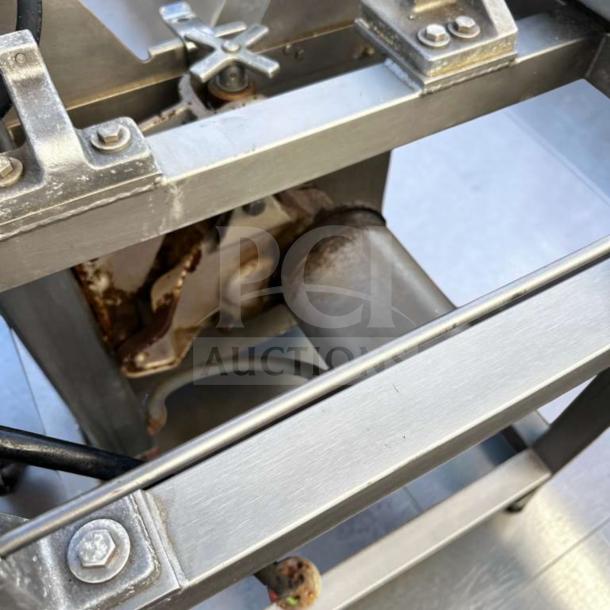 Hobart 5701D Commercial Meat Saw frame close-up, showcasing sturdy metal construction and components, superior condition.