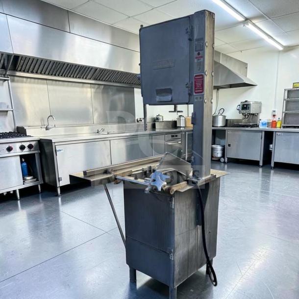 Hobart 5614 commercial meat saw, 2 HP, 3 phase, heavy duty, for parts or repair, in an industrial kitchen setting.