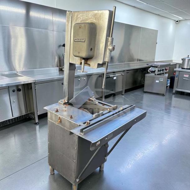 Hobart 5614 commercial meat saw, 2 HP, 3 phase, heavy duty, for parts or repair, visible wear, label shows Hobart branding.