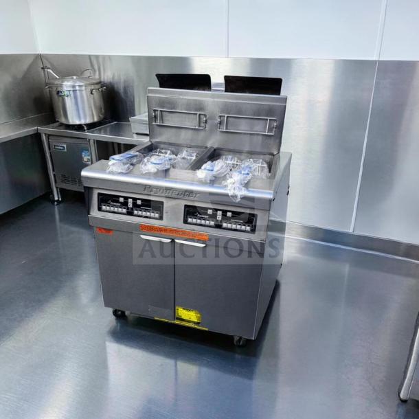 Prime condition Frymaster FPP245 gas fryer, split pots, built-in filtration, fully tested, and operational in stainless steel.