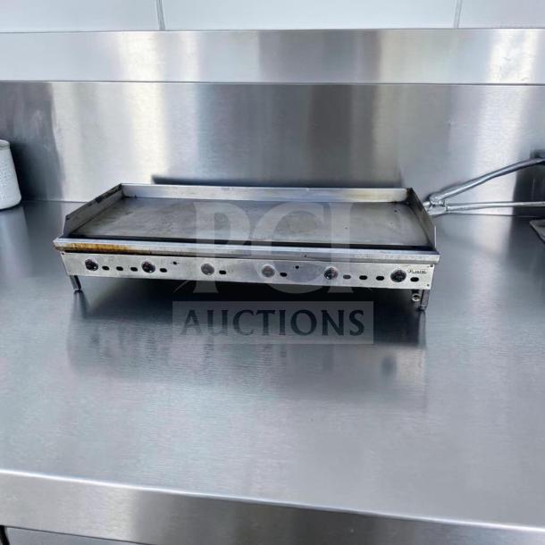 Elite condition Jade Range JGT-2472 72” commercial gas griddle with thermostatic controls, 180,000 BTU, fully tested.