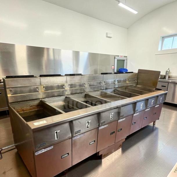 Pitco SSH55 commercial gas fryer battery, 5 units, 50 lb vats each, natural gas, built-in filtration, excellent condition.