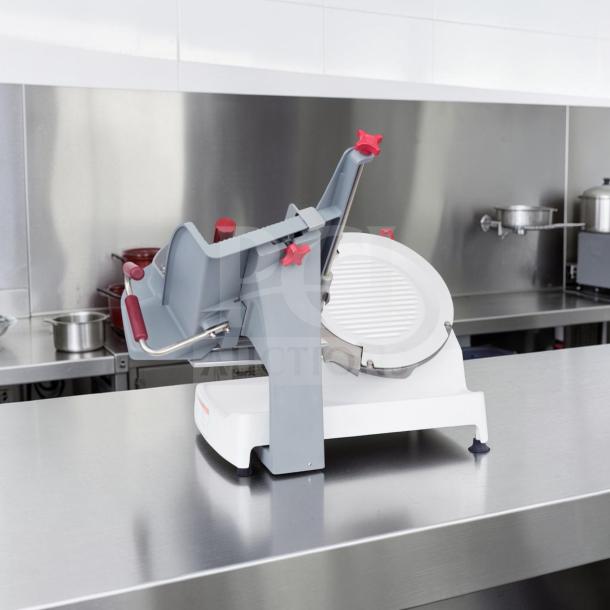 Berkel X13-PLUS 13" manual meat slicer, exceptional condition, gravity feed, 1/2 HP motor, fully tested operational.
