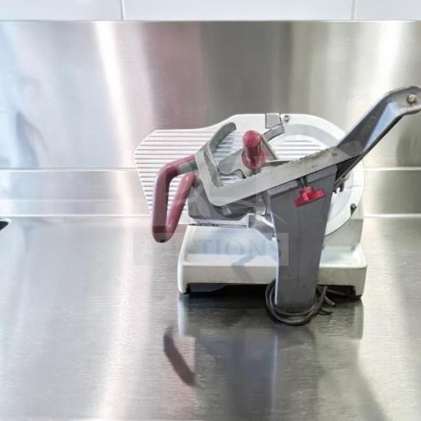 Berkel X13-PLUS 13" manual gravity feed meat slicer, 1/2 HP, pristine condition, fully tested, metal finish, model BER-L-SLC-0947.