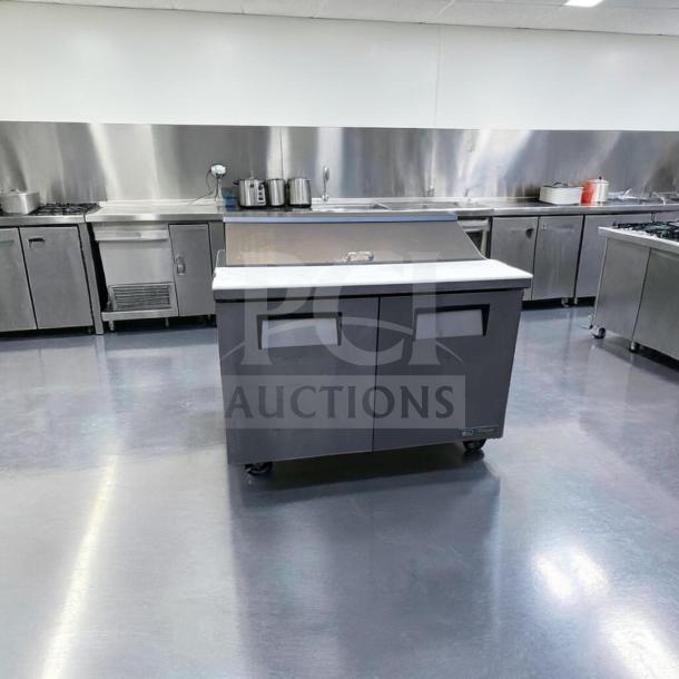 Top-tier condition True TSSU-48-12-HC sandwich/salad prep table, 48-inch, refrigerated base, 115V, fully tested.