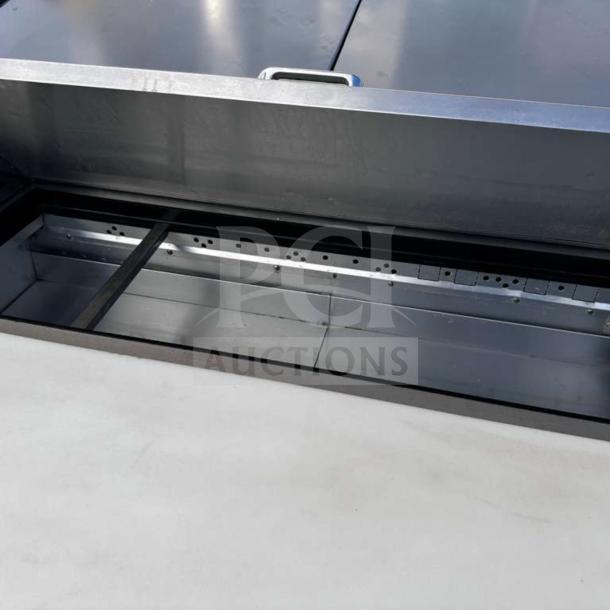 True TSSU-48-12-HC sandwich/salad prep table in top-tier condition, 48” width, refrigerated, fully tested, stainless steel.