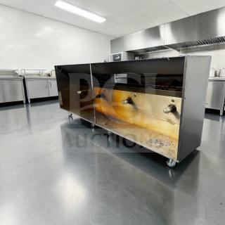 High-grade stainless steel commercial kitchen exhaust hood, wall mount, heavy-duty ventilation, ready for installation.