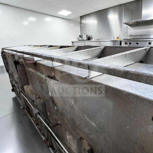 High-grade commercial stainless steel exhaust hood, wall mount, ready for installation, slight wear visible, model HOOD-L-SS-0939.