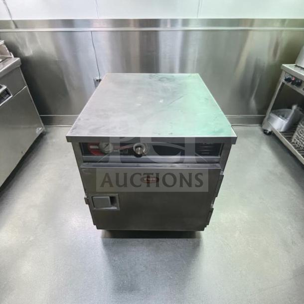 Superior condition FWE HLC-1826-4(A) heated holding cabinet, 4 pan capacity, stainless steel, UL & NSF certified, 120V, fully tested.