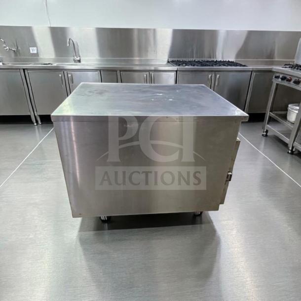 FWE HLC-1826-4(A) countertop heated cabinet, stainless steel, 4-pan capacity, UL & NSF certified, excellent condition.