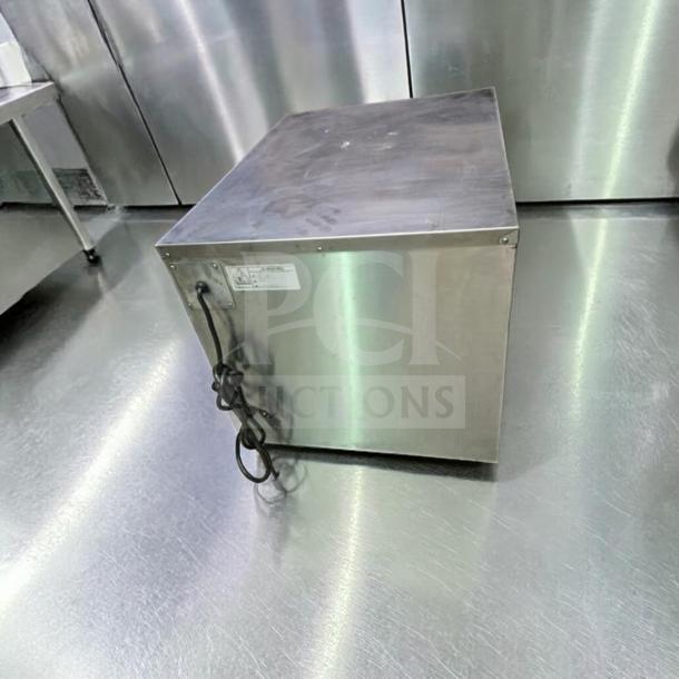 Superior condition FWE HLC-1826-4(A) countertop heated holding cabinet, stainless steel, 4 pan capacity, 120V, UL & NSF certified.