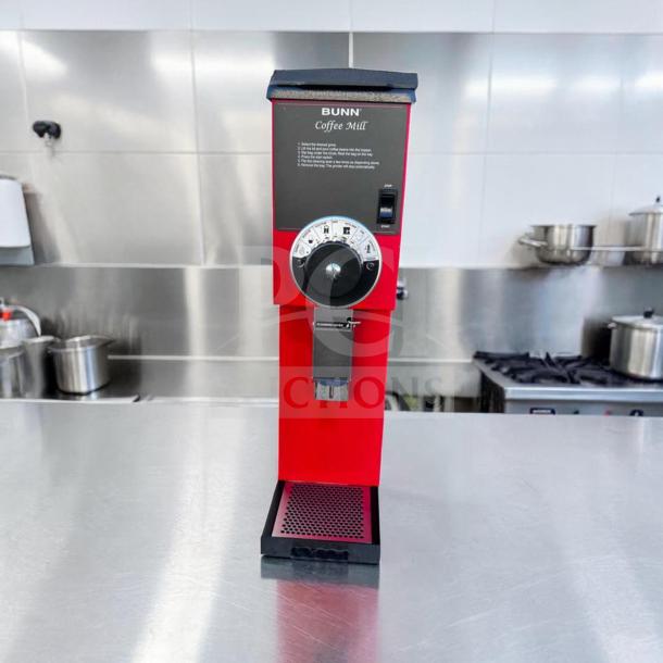 Bunn G3 HD 22100.0001 red commercial coffee grinder, elite condition, fully tested, 3 lb capacity, operational controls visible.