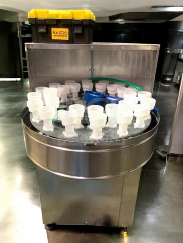 Tang Rotary Round Bottle Washer in superb condition, features automatic inner/outer rinse, fully tested, model TNG-L-WASH-0420.