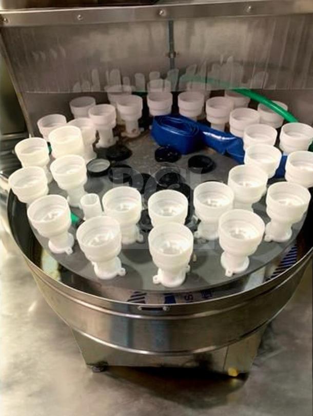 Tang Rotary Round Bottle Washer, superb condition, fully tested. Automatic inner/outer rinse functionality, model TNG-L-WASH-0420.