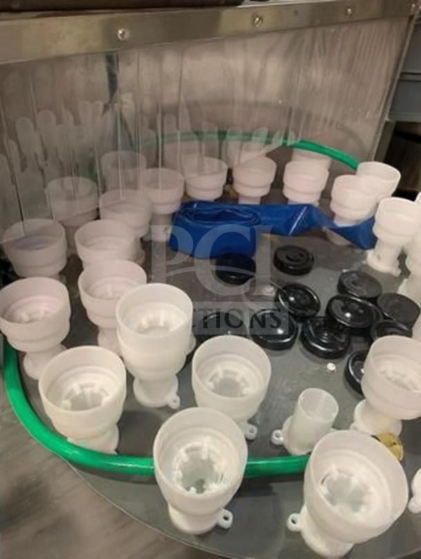 Tang Rotary Round Bottle Washer, superb condition, automatic inner/outer rinse, model TNG-L-WASH-0420, fully tested.