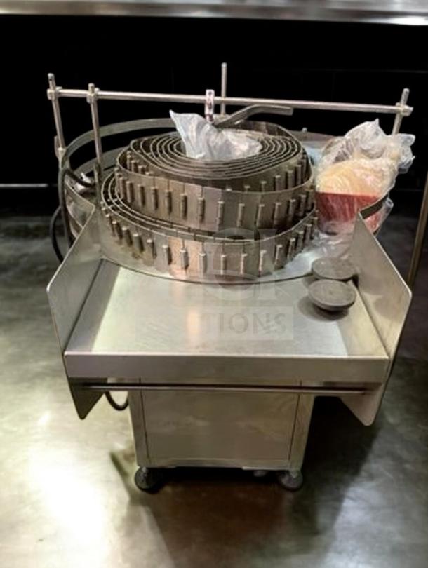 Tang Rotary Round Bottle Washer, model TNG-L-WASH-0420, in superb condition; automatic inner/outer rinse, fully tested.