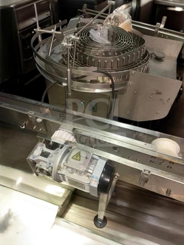 Tang Rotary Round Bottle Washer in superb condition, model TNG-L-WASH-0420; features automatic inner/outer rinse, fully tested.