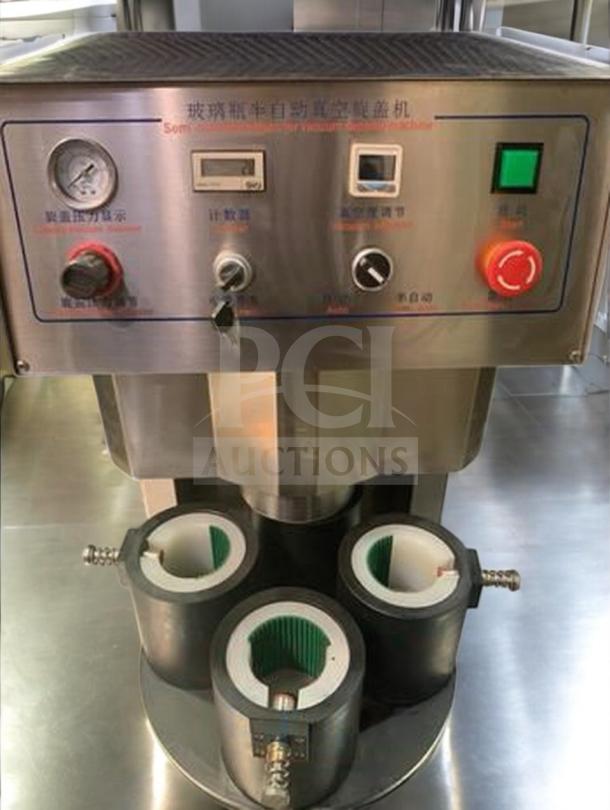 Tang Machinery Four-Station Semi-Automatic Vacuum Capper in premium condition. Secure vacuum-seal system, fully tested. Model TNG-L-CAP-0424.