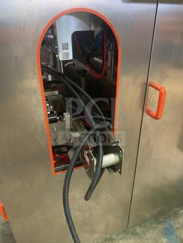 Tang Machinery Four-Station Vacuum Capper, semi-automatic, premium condition, for secure vacuum-seal bottle capping.