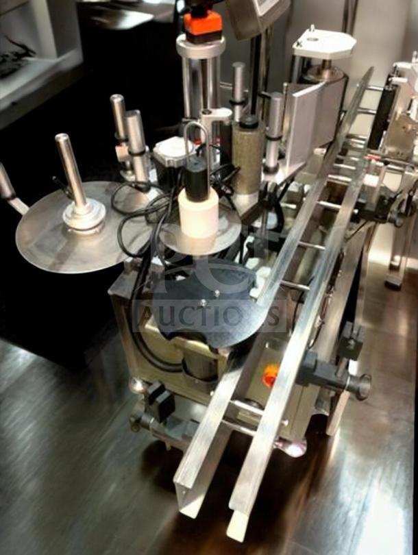 Tang Automatic Round Bottle Labeling Machine, Model TGM-TY01, high-speed 360° wrap, premium condition, fully tested.