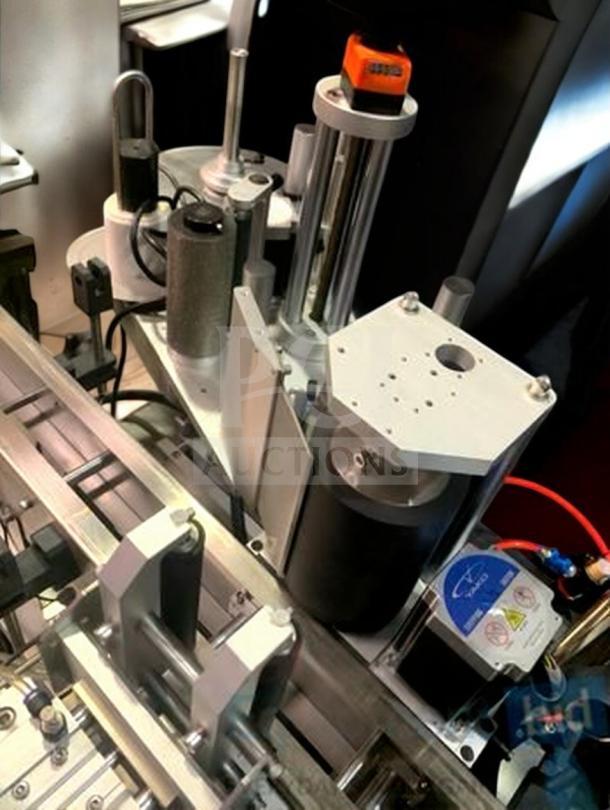 Tang Machinery TGM-TY01 automatic bottle labeling machine; high-speed 360° wrap, premium condition, fully tested.