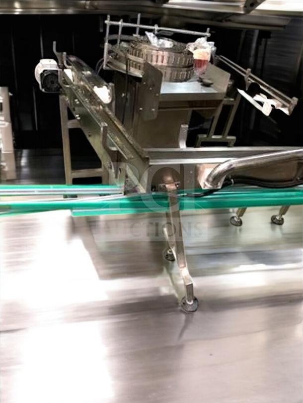 Industrial stainless steel bottle conveyor system, adjustable speed, fully tested, premium condition, model CONV-L-LINE-0427.