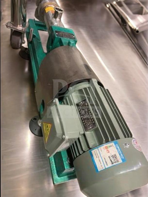 Premium condition Tang Screw Feeding Pump, model TNG-L-SCR-0422, for continuous sauce transfer, fully tested.