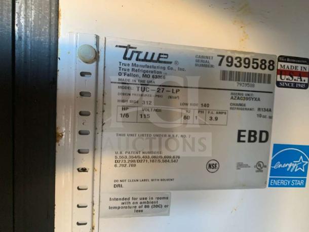 Immaculate True TUC-27-LP undercounter refrigerator label with model details, serial number, and Energy Star certification.