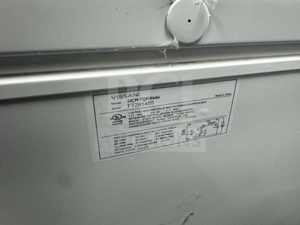 Vissani DCM7QRBWW 7 Cu. Ft. chest freezer, excellent condition, UL listed, 115V, model tag visible with specifications.