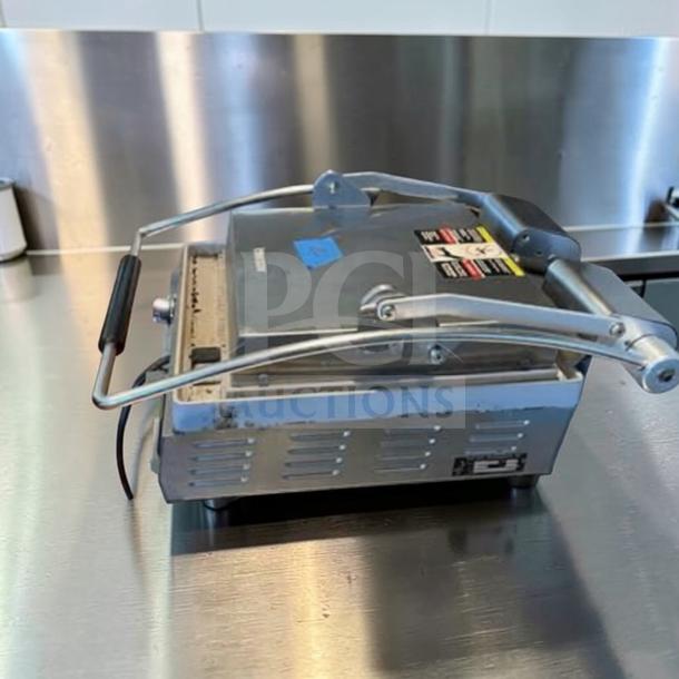 Star PGT14IE Panini Press, single grill, cast iron grooved plates, 240V, excellent condition, fully operational.