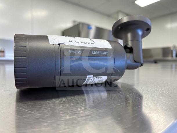 Samsung iPOLIS SNO-6084RN HD network bullet camera, superior condition, PoE/12V/24V, labels visible, fully operational.