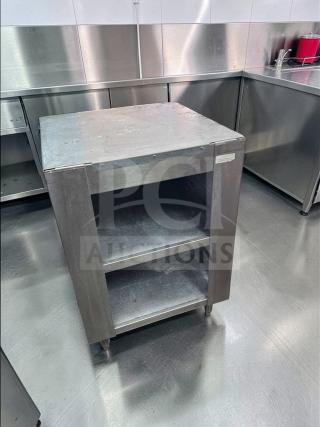 Commercial stainless steel equipment stand, excellent condition, heavy-duty, open shelf, model COM-S-STD-0687. Ideal for kitchen use.