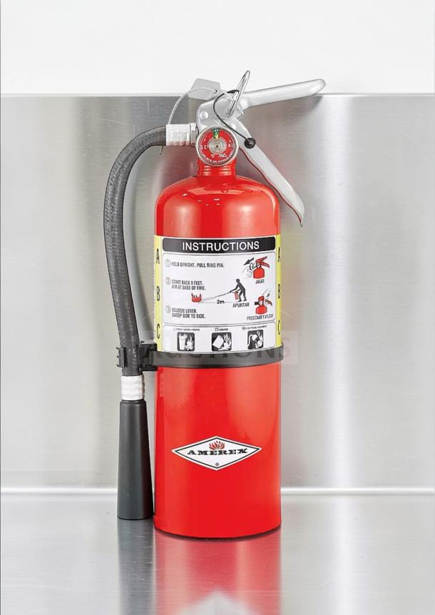 Commercial 5 lb ABC fire extinguisher, UL listed, 2A:10B:C rating. Prime condition for kitchen safety. Amerex logo visible.