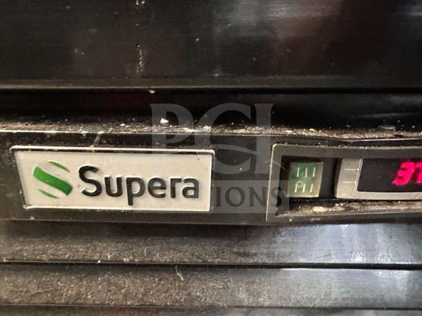 Supera G1M-16-B-1 glass door merchandiser with visible brand logo and temperature display, fully tested.