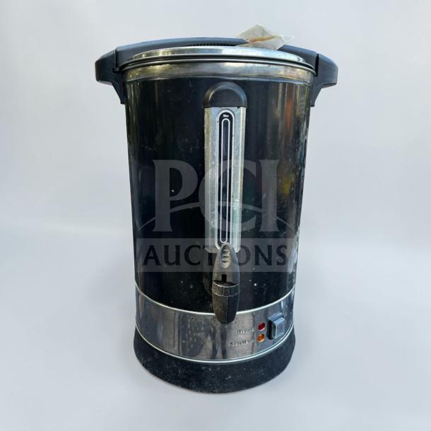 Exceptional condition commercial coffee urn by Commercial Beverage Equipment, electric model, large capacity, includes spout and indicator lights.
