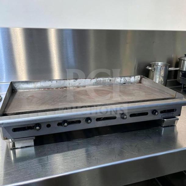 Imperial ITG-60 60" commercial gas griddle with 1" steel plate, thermostatic controls, natural gas, superior condition.