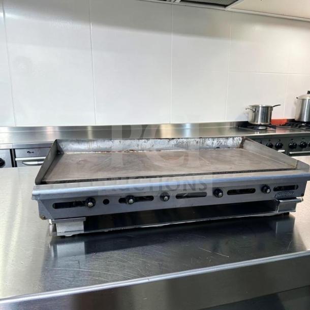 Imperial ITG-60 60" gas griddle with 1" steel plate and thermostatic controls. Superior condition, tested and operational.